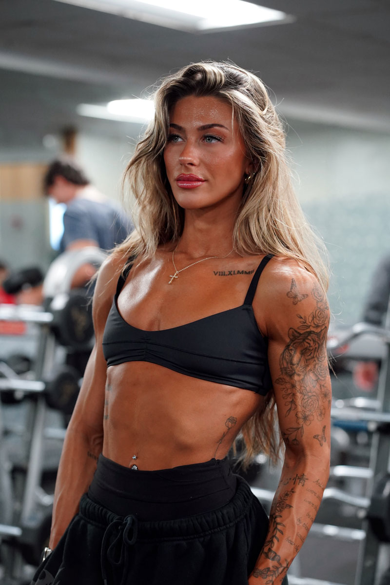 The coach is working out at the gym.
